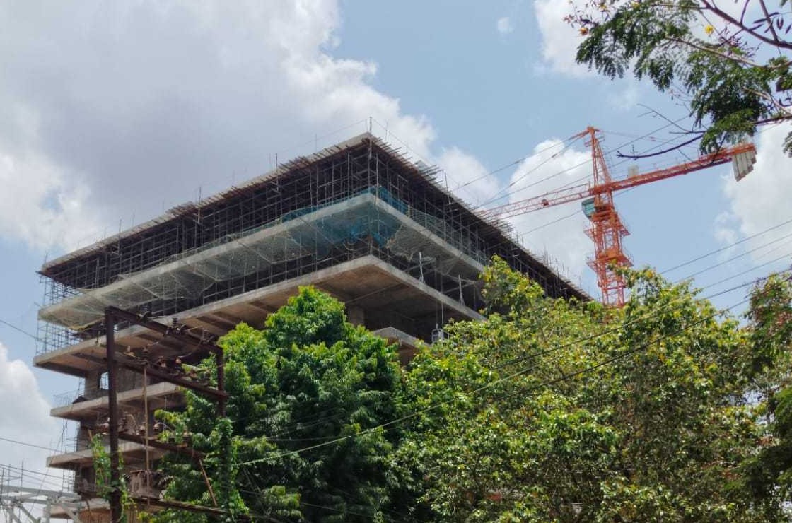 Construction crane and upper structure view of the OMC office project
